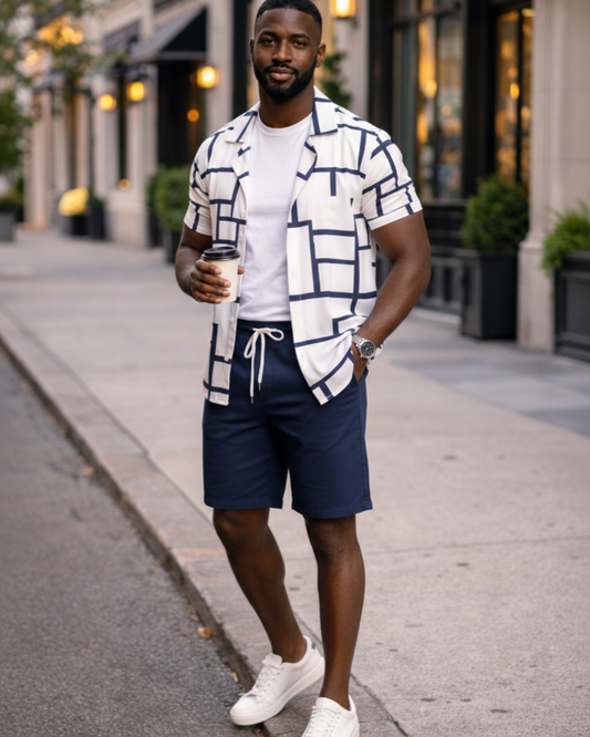 patterned shirt and navy shorts